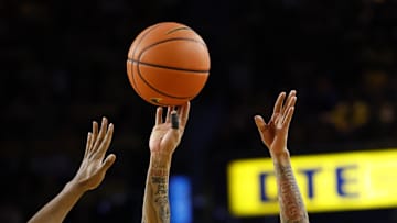 Feb 17, 2024; Ann Arbor, Michigan, USA;  Michigan Wolverines guard Dug McDaniel (0) shoots in the