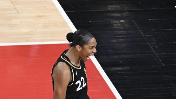 Oct 11, 2023; Las Vegas, Nevada, USA; Las Vegas Aces forward A'ja Wilson (22) reacts to being fouled by the New York Liberty in the first half during game two of the 2023 WNBA Finals at Michelob Ultra Arena. Mandatory Credit: Candice Ward-USA TODAY Sports