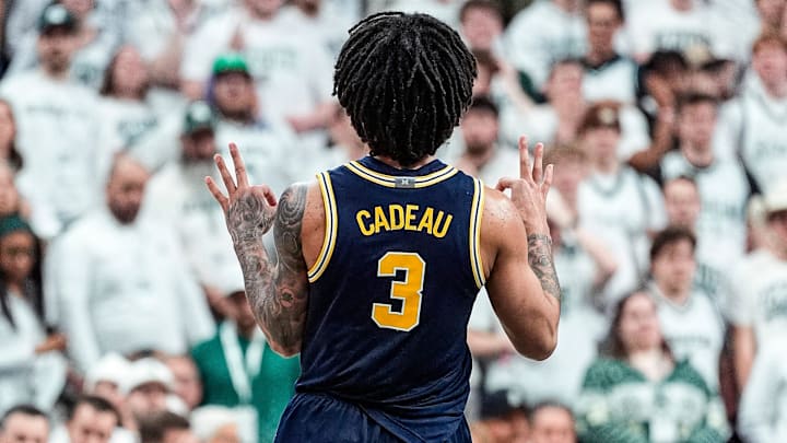 Michigan guard Elliot Cadeau (3) celebrates a 3-pointer against Michigan State during the second half at Breslin Center in East Lansing on Friday, Jan. 30, 2026.