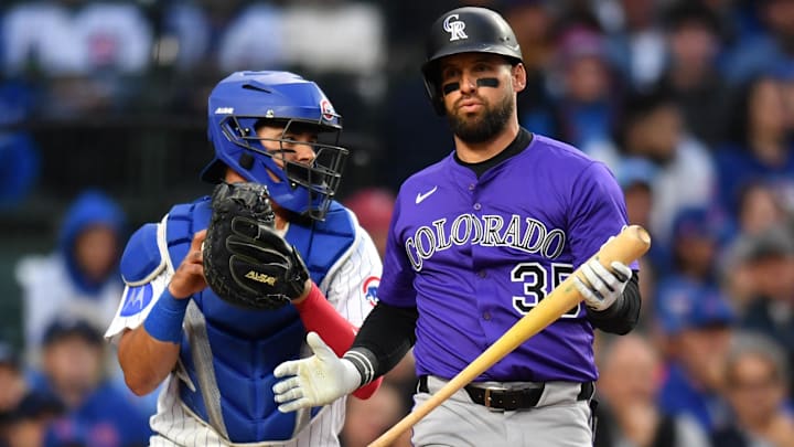May 27, 2025; Chicago, Illinois, USA; Colorado Rockies designated hitter Nick Martini (35) reacts after striking out during the second inning against the Chicago Cubs at Wrigley Field.