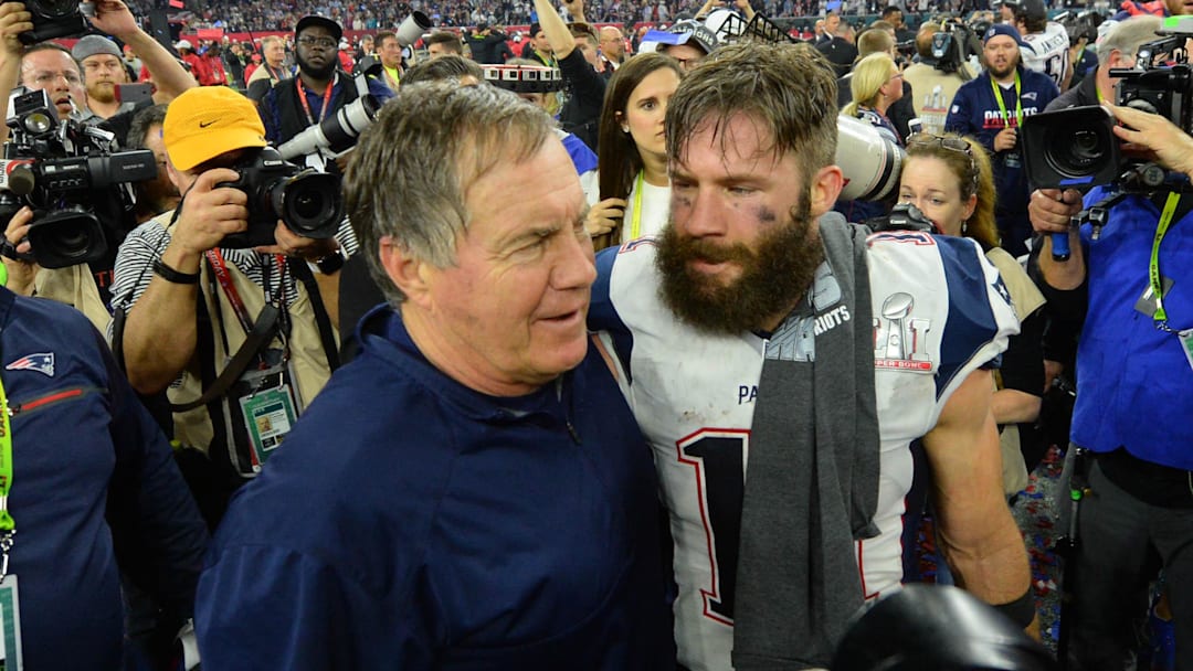 New England Patriots head coach Bill Belichick celebrates with wide receiver Julian Edelman after Super Bowl LI in Houston.