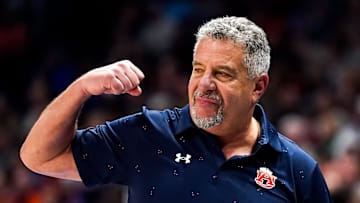 Auburn head coach Bruce Pearl celebrates during the second half of the SEC tournament championship game against Florida at Bridgestone Arena in Nashville, Tenn., Sunday, March 17, 2024.