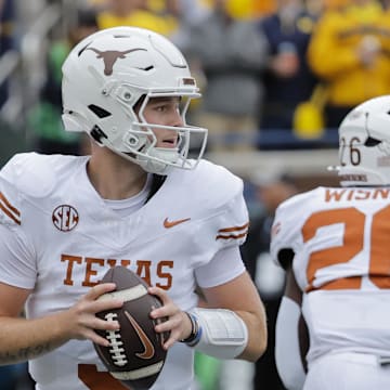 Sep 7, 2024; Ann Arbor, Michigan, USA;  Texas Longhorns quarterback Quinn Ewers (3) passes in the second half against the Michigan Wolverines at Michigan Stadium. Mandatory Credit: Rick Osentoski-Imagn Images