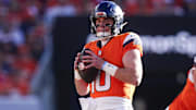 Nov 16, 2025; Denver, Colorado, USA;  Denver Broncos quarterback Bo Nix (10) looks to pass during the first quarter of the game against the Kansas City Chiefs at Empower Field at Mile High. 