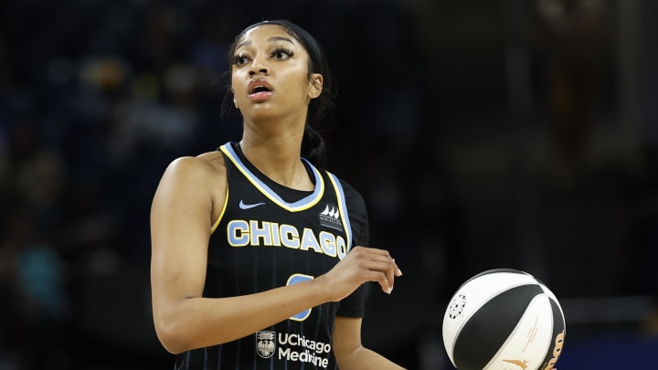 Jun 12, 2024; Chicago, Illinois, USA; Chicago Sky forward Angel Reese (5) looks to pass the ball against the Connecticut Sun during the second half of a basketball game at Wintrust Arena.