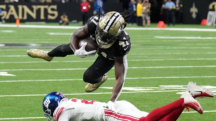 Oct 5, 2025; New Orleans, Louisiana, USA; New Orleans Saints running back Alvin Kamara (41) runs the ball against the New York Giants during the second quarter at Caesars Superdome. Mandatory Credit: Matthew Hinton-Imagn Images