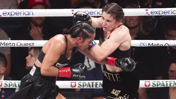 Amanda Serrano and Katie Taylor compete in a boxing match.