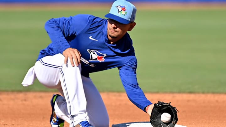Feb 17, 2026; Dunedin, FL, USA;  Toronto Blue Jays infielder Andres Gimenez (0) catches the ball during spring training at Bobby Mattick Training Center at Englebert Complex. Mandatory Credit: Jonathan Dyer-Imagn Images