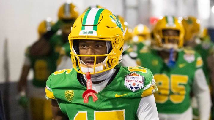 Jan 1, 2024; Glendale, AZ, USA; Oregon Ducks wide receiver Tez Johnson (15) against the Liberty Flames during the 2024 Fiesta Bowl at State Farm Stadium.