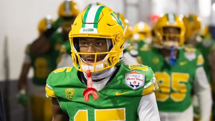 Jan 1, 2024; Glendale, AZ, USA; Oregon Ducks wide receiver Tez Johnson (15) against the Liberty Flames during the 2024 Fiesta Bowl at State Farm Stadium.