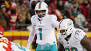 Jan 13, 2024; Kansas City, Missouri, USA; Miami Dolphins quarterback Tua Tagovailoa (1) gestures at the line of scrimmage against the Kansas City Chiefs in a 2024 AFC wild card game at GEHA Field at Arrowhead Stadium. Mandatory Credit: Denny Medley-USA TODAY Sports