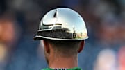 Jun 17, 2022; Omaha, NE, USA; A detail view of a Notre Dame helmet reflects during the game against the Texas Longhorns at Charles Schwab Field. 