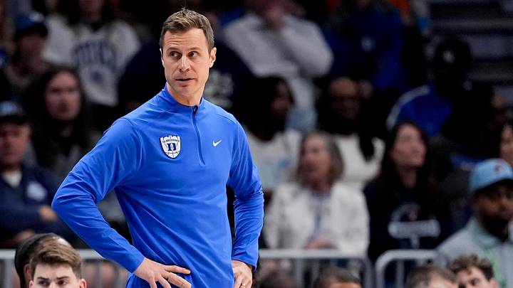 Mar 14, 2026; Charlotte, NC, USA; Duke Blue Devils head coach Jon Scheyer looks on against the Virginia Cavaliers during the men's ACC Conference Tournament Championship at Spectrum Center. Mandatory Credit: Jim Dedmon-Imagn Images
