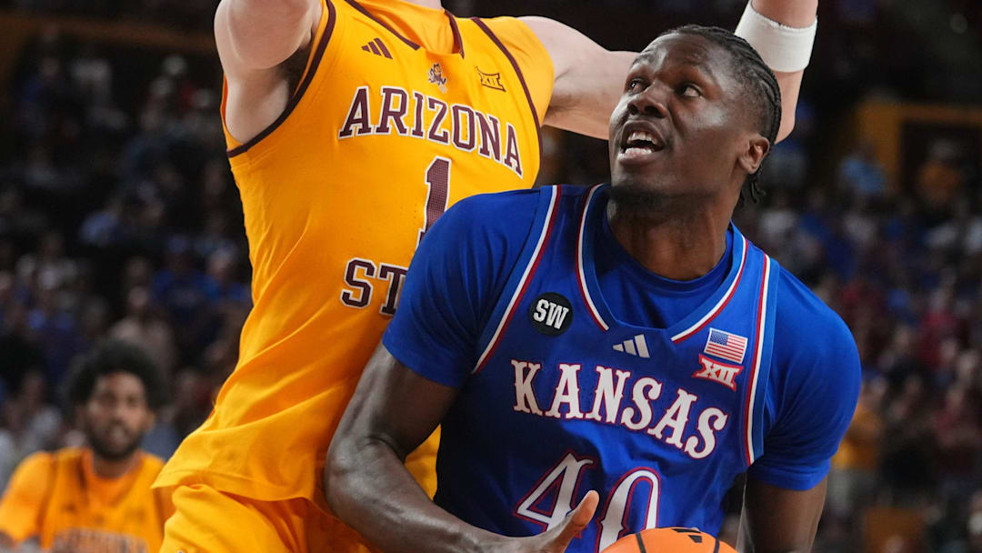 ASU Sun Devils forward Santiago Trouet (1) defends Kansas Jayhawks forward Flory Bidunga (40) at Desert Financial Arena in Tempe, on March 3, 2026.