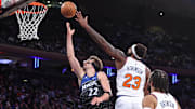 Nov 12, 2025; New York, New York, USA;  Orlando Magic forward Franz Wagner (22) drives past New York Knicks center Mitchell Robinson (23) in the third quarter at Madison Square Garden. Mandatory Credit: Wendell Cruz-Imagn Images