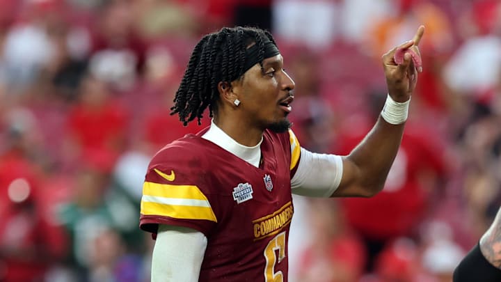 Sep 8, 2024; Tampa, Florida, USA;  Washington Commanders quarterback Jayden Daniels (5) against the Tampa Bay Buccaneers during the second half at Raymond James Stadium. Mandatory Credit: Kim Klement Neitzel-Imagn Images