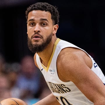 Jan 25, 2025; Charlotte, North Carolina, USA; New Orleans Pelicans forward Jeremiah Robinson-Earl (50) brings the ball up court against the Charlotte Hornets during the third quarter at Spectrum Center. Mandatory Credit: Scott Kinser-Imagn Images