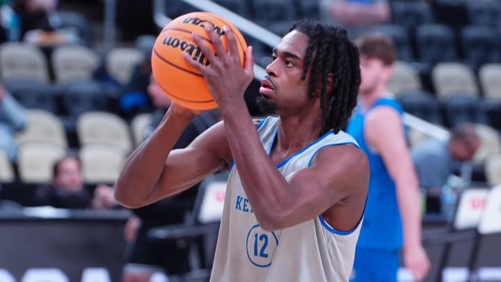 Mar 20, 2024; Pittsburgh, PA, USA; Kentucky Wildcats guard Antonio Reeves (12) shoots the ball during the NCAA first round practice session at PPG Paints Arena. Mandatory Credit: Gregory Fisher-USA TODAY Sports
