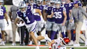 Sep 13, 2024; Manhattan, Kansas, USA; Kansas State Wildcats wide receiver Jayce Brown (1) breaks a by Arizona Wildcats defensive back Gunner Maldonado (9) during the third quarter at Bill Snyder Family Football Stadium. Mandatory Credit: Scott Sewell-Imagn Images