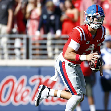 Sep 7, 2024; Oxford, Mississippi, USA; Mississippi Rebels quarterback Jaxson Dart (2) scrambles out of the backfield during the first half against the Middle Tennessee Blue Raiders at Vaught-Hemingway Stadium. Mandatory Credit: Petre Thomas-Imagn Images