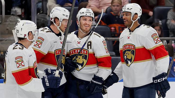 Mar 28, 2026; Elmont, New York, USA; Florida Panthers left wing Matthew Tkachuk (19) celebrates his goal against the New York Islanders with centers Carter Verhaeghe (23) and Eetu Luostarinen (27) and defenseman Seth Jones (3) during the first period at UBS Arena. Mandatory Credit: Brad Penner-Imagn Images