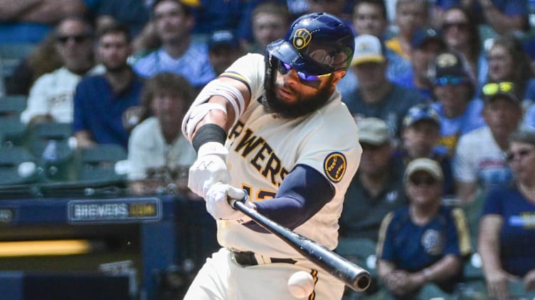 Jun 8, 2023; Milwaukee, Wisconsin, USA; Milwaukee Brewers first baseman Jon Singleton (12) drives in