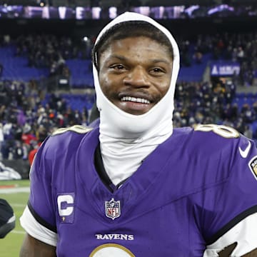 Jan 11, 2025; Baltimore, Maryland, USA; Baltimore Ravens quarterback Lamar Jackson (8) celebrates after defeating the Pittsburgh Steelers in an AFC wild card game at M&T Bank Stadium. Mandatory Credit: Geoff Burke-Imagn Images