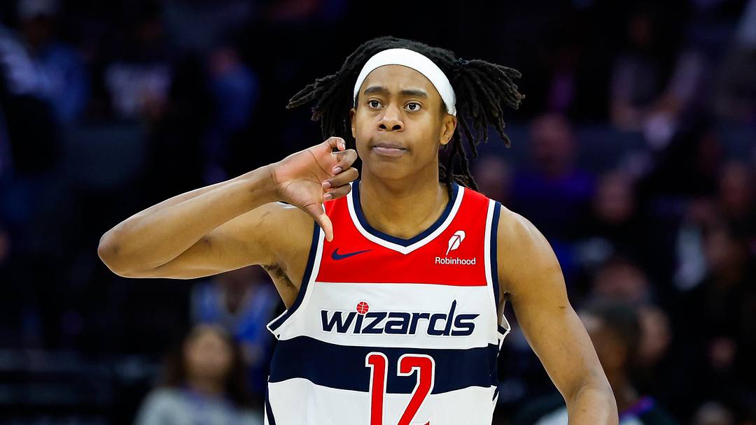 Jan 16, 2026; Sacramento, California, USA; Washington Wizards guard Tre Johnson (12) reacts after scoring during the third quarter against the Sacramento Kings at Golden 1 Center. Mandatory Credit: Sergio Estrada-Imagn Images