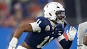 Dec 31, 2024; Glendale, AZ, USA; Penn State Nittany Lions defensive end Abdul Carter (11) against the Boise State Broncos in the Fiesta Bowl at State Farm Stadium. Mandatory Credit: Mark J. Rebilas-Imagn Images