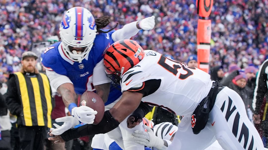 Dec 7, 2025; Orchard Park, New York, USA; Buffalo Bills running back James Cook III (4) fumbles the ball in the third quarter against the Cincinnati Bengals at Highmark Stadium.