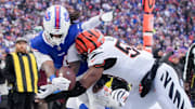 Dec 7, 2025; Orchard Park, New York, USA; Buffalo Bills running back James Cook III (4) fumbles the ball in the third quarter against the Cincinnati Bengals at Highmark Stadium.
