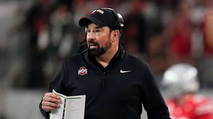 Ohio State Buckeyes head coach Ryan Day watches from the sideline during the Cotton Bowl at AT&T Stadium in Arlington, Texas for the College Football Playoff quarterfinal game against the Miami Hurricanes on Dec. 31, 2025.