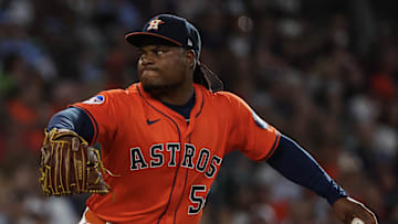 Jul 12, 2025; Houston, Texas, USA; Houston Astros starting pitcher Framber Valdez (59) pitches against the Texas Rangers  in the first inning at Daikin Park. Mandatory Credit: Thomas Shea-Imagn Images