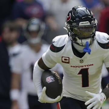 Sep 8, 2024; Indianapolis, Indiana, USA; Houston Texans wide receiver Stefon Diggs (1) runs with the ball at Lucas Oil Stadium. Mandatory Credit: Grace Hollars-USA TODAY Network via Imagn Images