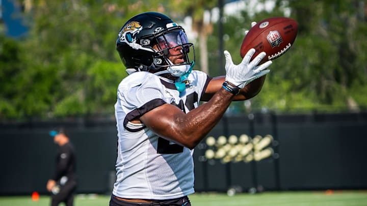 Jacksonville Jaguars safety Daniel Thomas (20) hauls in a pass while running routes during the seventh organized team activity at the Miller Electric Center in Jacksonville, Fla. Monday, June 2, 2025. [Doug Engle/Florida Times-Union]