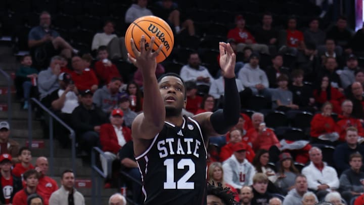 Dec 13, 2025; Salt Lake City, Utah, USA; Mississippi State Bulldogs guard Josh Hubbard (12) goes for a layup against the Utah Utes during the first half at Delta Center. Mandatory Credit: Rob Gray-Imagn Images