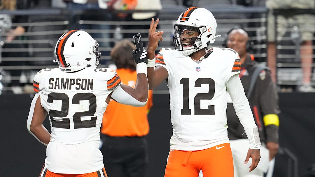Cleveland Browns quarterback Shedeur Sanders with running back Dylan Sampson