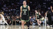 Jun 25, 2024; Belmont Park, New York, USA; Minnesota Lynx guard Kayla McBride (21) celebrates in the fourth quarter against the New York Liberty in the Commissioner’s Cup Championship game at UBS Arena. Mandatory Credit: Wendell Cruz-USA TODAY Sports