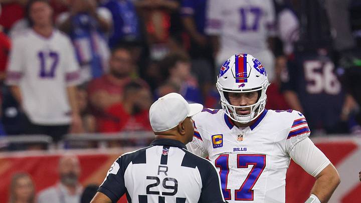 Nov 20, 2025; Houston, Texas, USA; Buffalo Bills quarterback Josh Allen (17) talks with referee Adrian Hill (29) during an officials timeout as he plays against the Houston Texans in the first half  at NRG Stadium. Mandatory Credit: Thomas Shea-Imagn Images
