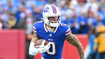Dec 29, 2024; Orchard Park, New York, USA; Buffalo Bills wide receiver Keon Coleman (0) carries the ball after making a catch in the second quarter against the New York Jets at Highmark Stadium. Mandatory Credit: Mark Konezny-Imagn Images
