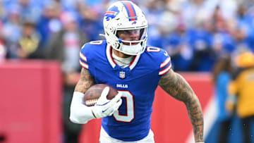 Dec 29, 2024; Orchard Park, New York, USA; Buffalo Bills wide receiver Keon Coleman (0) carries the ball after making a catch in the second quarter against the New York Jets at Highmark Stadium. Mandatory Credit: Mark Konezny-Imagn Images