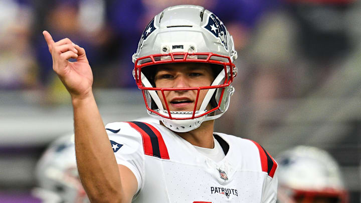 Aug 16, 2025; Minneapolis, Minnesota, USA;  New England Patriots quarterback Drake Maye (10) warms up before the game against the Minnesota Vikings at U.S. Bank Stadium. Mandatory Credit: Jeffrey Becker-Imagn Images