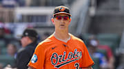 Jul 5, 2025; Cumberland, Georgia, USA; Baltimore Orioles interim manager Tony Mansolino (36) on the field during the game against the Atlanta Braves at Truist Park. Mandatory Credit: Dale Zanine-Imagn Images