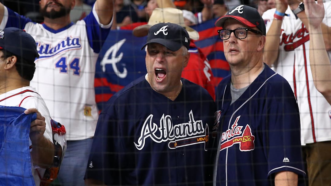 Atlanta Braves fans celebrate after the team defeated the Houston Astros in game six of the 2021 World Series at Minute Maid Park.