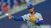 Sep 28, 2025; Miami, Florida, USA; New York Mets shortstop Francisco Lindor (12) throws to first base to retire Miami Marlins shortstop Otto Lopez (not pictured) during the second inning at loanDepot Park. Mandatory Credit: Sam Navarro-Imagn Images