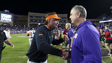 Oklahoma State Cowboys head coach Mike Gundy (left) shakes hands with TCU Horned Frogs head coach Sonny Dykes (right). Mandatory Credit: Kevin Jairaj-Imagn Images