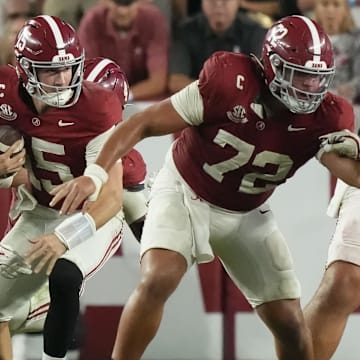 Nov 15, 2025; Tuscaloosa, Alabama, USA;  Oklahoma Sooners defensive back Devon Jordan (12) puts pressure on Alabama Crimson Tide quarterback Ty Simpson (15) at Saban Field at Bryant-Denny Stadium. Oklahoma defeated Alabama 23-21.