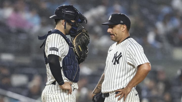 Aug 8, 2024; Bronx, New York, USA;  New York Yankees catcher Austin Wells (28) talks with starting pitcher Nestor Cortes (65) in the fifth inning against the Los Angeles Angels at Yankee Stadium. Mandatory Credit: Wendell Cruz-USA TODAY Sports