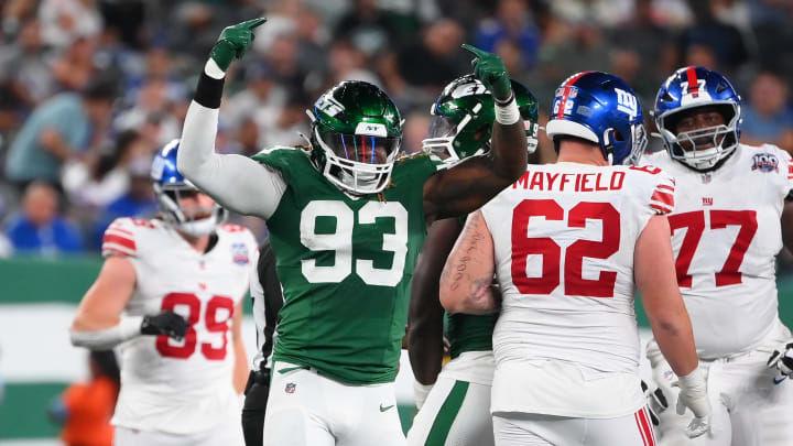 Aug 24, 2024; East Rutherford, New Jersey, USA; New York Jets defensive end Takkarist McKinley (93) reacts to a defensive play against the New York Giants during the second half at MetLife Stadium. Mandatory Credit: Rich Barnes-USA TODAY Sports