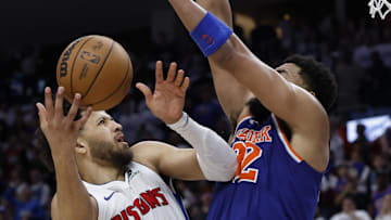 Apr 24, 2025; Detroit, Michigan, USA; Detroit Pistons guard Cade Cunningham (2) shoots on New York Knicks center Karl-Anthony Towns (32) in the second half during game three of first round for the 2024 NBA Playoffs at Little Caesars Arena. Mandatory Credit: Rick Osentoski-Imagn Images
